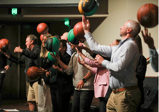Tasmanian Jack Jumpers Event - spinning basketballs on their fingers