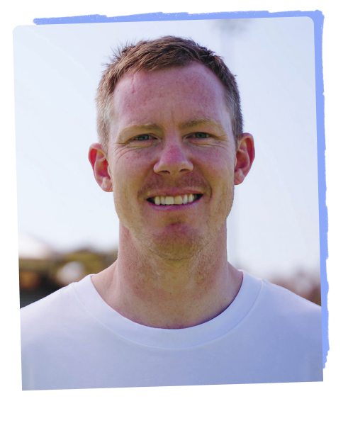 Portrait of Jack Riewoldt smiling and wearing a white t-shirt.