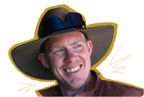 Jack Riewoldt smiling with an Akubra on with illustrations around him.